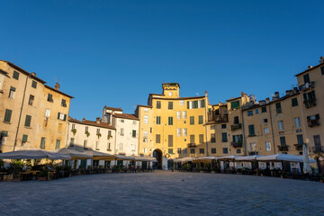Fototapeta na wymiar Amphitheater square in Lucca. Tuscany, Italy