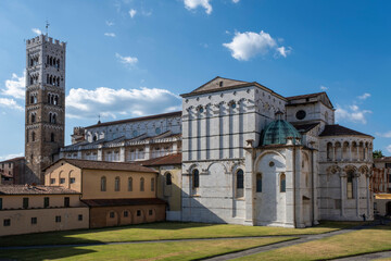 Fototapeta na wymiar Lucca, Italy, June 8, 2019:Exterior view of the church of San Michele in Foro, a Roman Catholic basilica church in Lucca, Tuscany, central Italy