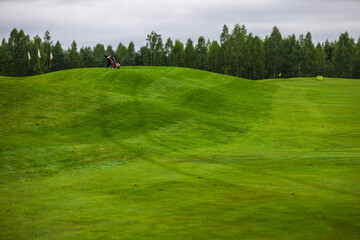 Fototapeta premium Playing golf. Golf course and Bag