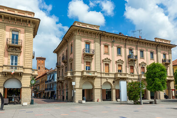 Buildings on small square in town of Alba, Italy. - obrazy, fototapety, plakaty