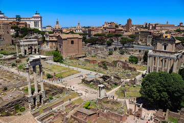 Obraz na płótnie Canvas Cityscape view of the Roman Forum at Palatino hill. Historical part of the capital of Italy. Ancient ruins