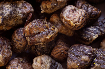 super macro shot food baground .Indian cardamom seeds shot very close up and seen in detail