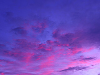 Misty clouds with pink highlights