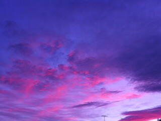 Fototapeta na wymiar Cloud wash of blues, purples and pinks