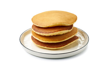Dish with stacked pancakes on white