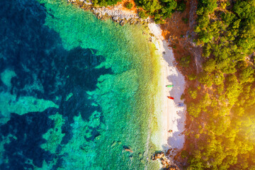 Beautiful crystal clear azure water at Antisamos beach on Kefalonia island, Greece. Beautiful sea bay with Antisamos beach on Kefalonia island, Ionian island, Cephalonia, Antisamos beach, Greece.