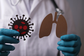 concept doctor with virus in the hand