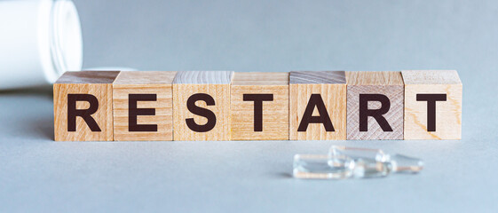 Wooden Blocks with the text: Restart. Medical concept.