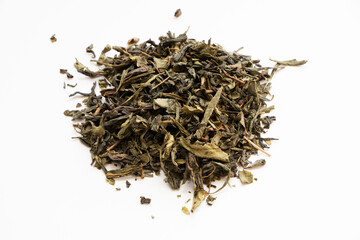 pile of green tea on white background