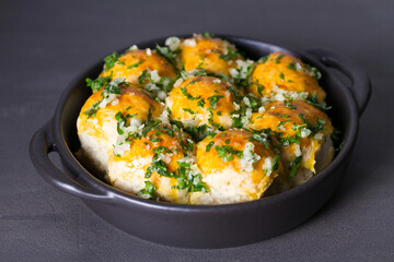 Buns Pampushky - Ukrainian garlic bread. Bread rolls with garlic and parsley