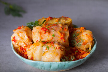 Cabbage rolls with meat, rice and vegetables. Chou farci, dolma, sarma, golubtsi or golabki