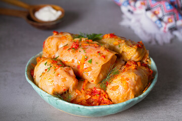 Cabbage rolls with meat, rice and vegetables. Chou farci, dolma, sarma, golubtsi or golabki