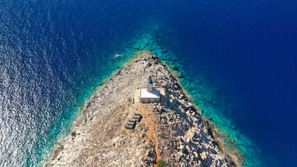 Aerial drone photo of iconic lighthouse in scenic Cape Matapan or Tainaron the Southest part of mainland Greece, Mani, Peloponnese, Greece
