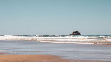 rock on the ocean horizon