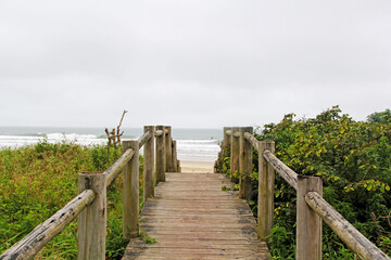 wooden bridge on beach
