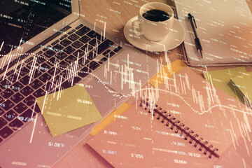 Multi exposure of forex graph drawing and desktop with coffee and items on table background. Concept of financial market trading
