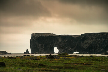 Dyrhólaey, formerly known by seamen as Cape Portland, is a small promontory located on the south coast of Iceland, not far from the village Vík. In fact, Dyrhólaey is the southernmost point in mainlan