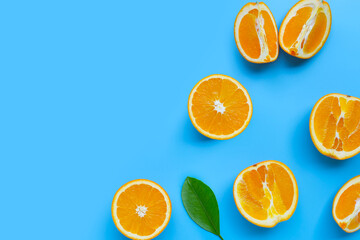 High vitamin C, Juicy and sweet. Fresh orange fruit  on blue background.