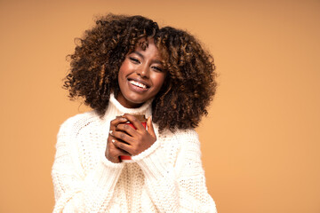 Happy afro girl with cup of coffee.