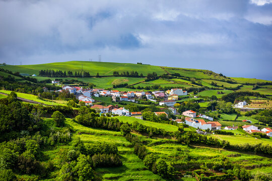 View of Pedreira village at northeast coast of Sao Miguel island, Azores, Portugal. View of Pedreira village and Pico do Bartolomeu at northeast coast of Sao Miguel island, Azores, Portugal.