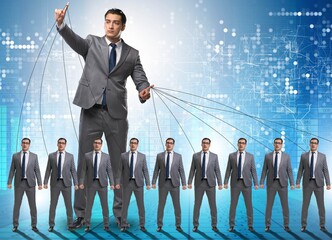 Boss employee manipulating his staff in business concept