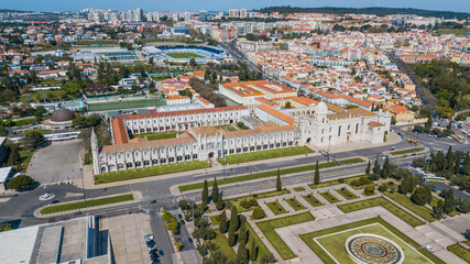 Lisbon. Aerial view of the Jerónimos Monastery and the garden of Império square, in the Belém...