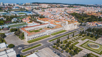 Fototapeta na wymiar Lisbon. Aerial view of the Jerónimos Monastery and the garden of Império square, in the Belém neighborhood, Lisbon, Portugal