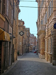 Italy, Marche, Macerata, downtown medieval street.