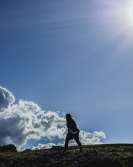 Girl hiking in the hills
