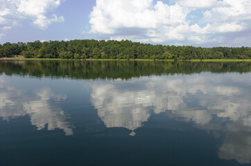 Fototapeta premium clouds over the river