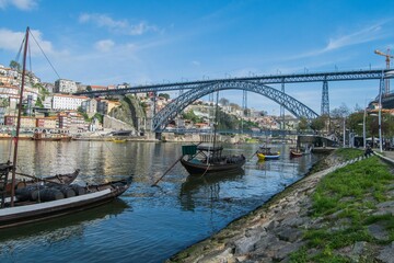 Fototapeta na wymiar Porto city, Portugal. View of the river, with the boats and the city in the background
