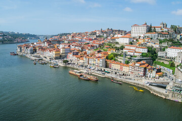 Fototapeta na wymiar View of the city of Porto and the waterfront of the Douro river in Portugal