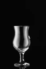 Empty glass on dark background