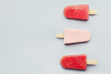 Tasty watermelon ice-cream on light background