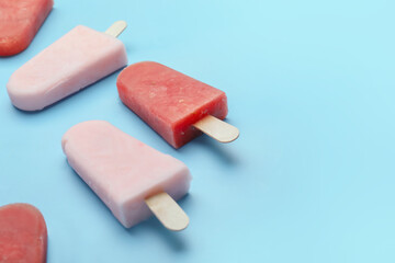 Tasty watermelon ice-cream on color background