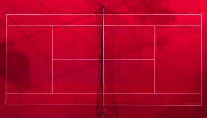 Top down view of a red tennis court