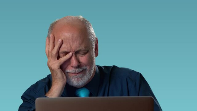 Overworked Tired Office Worker Uses Desktop Computer but Falls Asleep Fast. Tired Frustrated Exhausted Businessman Falls asleep at His Job