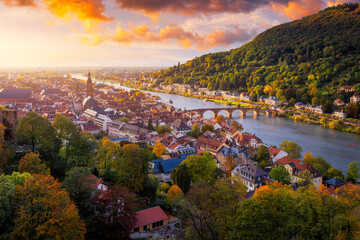 Landmark and beautiful Heidelberg town with Neckar river, Germany. Heidelberg town with the famous Karl Theodor old bridge and Heidelberg castle, Heidelberg, Germany. - obrazy, fototapety, plakaty