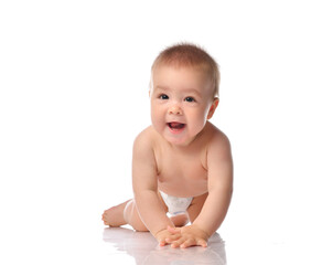 Cute little baby with evil smile crawling on floor