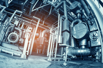 Industry plant concept,Equipment, cables and piping as found inside of a modern industrial power plant or offshore platform