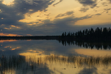 Fototapeta na wymiar Colorful Sunset over Astotin Lake, Elk Island National Park
