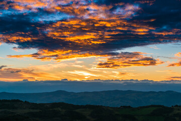 Three mountains one sunset