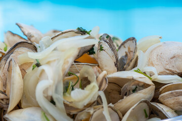 Delicious Lambreta (kind of clam), cooked with onions and cilantro