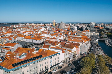 Fototapeta na wymiar .Top view of the city, narrow streets and roofs of houses with red tiles Cascais.