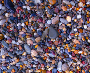 Colored pebbles on beach