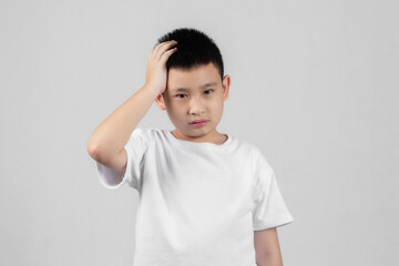 Asian boys studio portrait on gray background