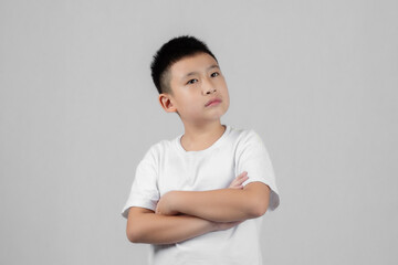 Asian boys studio portrait on gray background