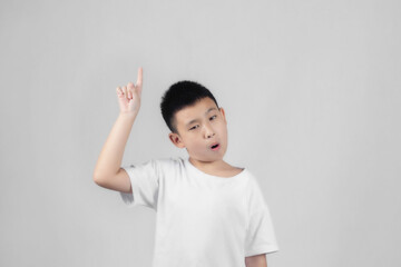 Asian boys studio portrait on gray background