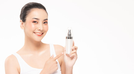 Beauty asian woman hold bottle cosmetic cream lotion  and cheerful.