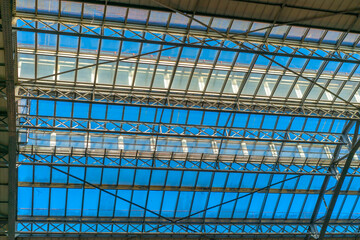 Fototapeta na wymiar interior of greenhouse in garden with transparent glass roof.